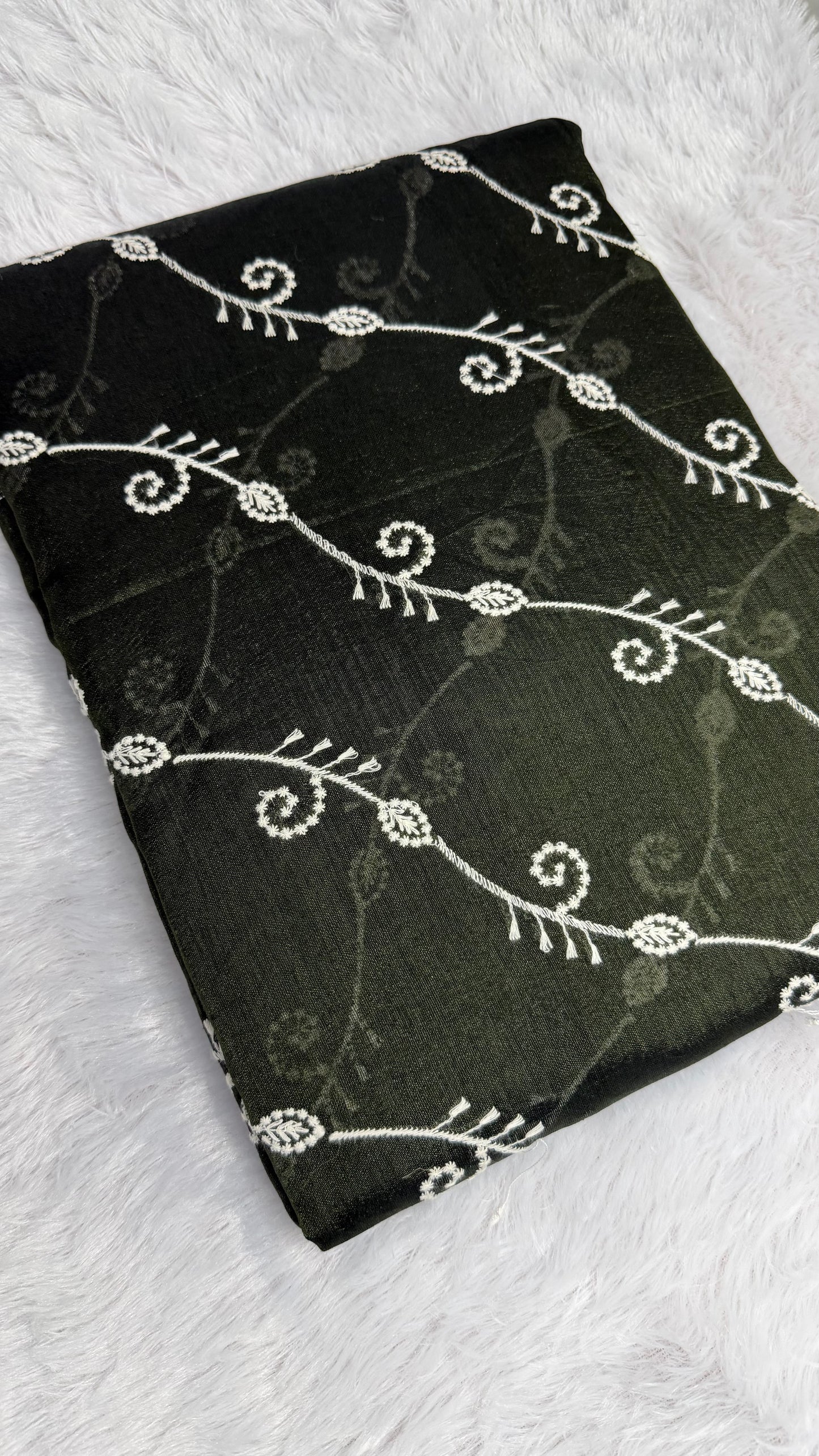 FOREST GREEN SEMI TUSSAR SILK SAREE WITH LEHARIYA EMBROIDARY.