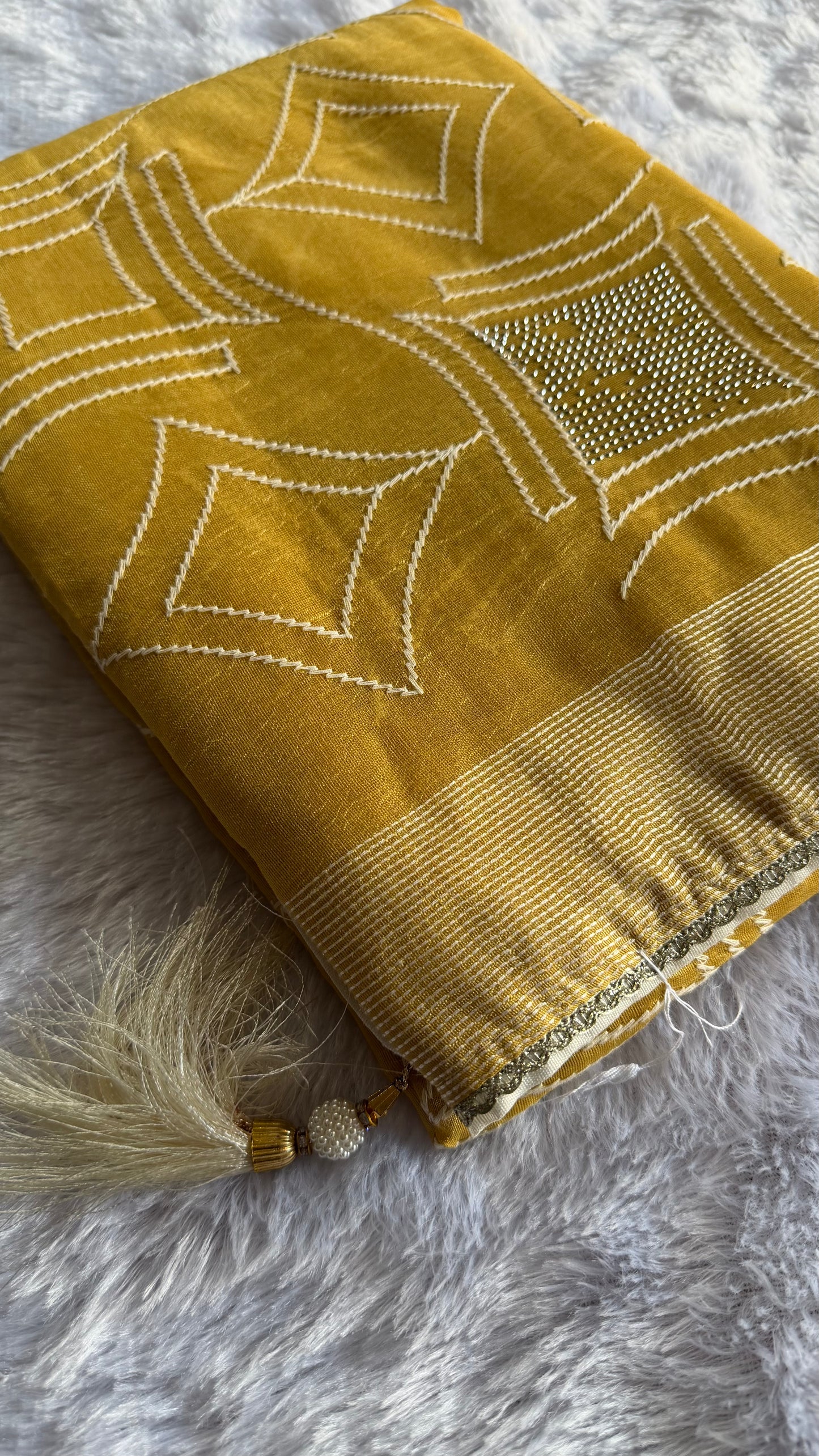 YELLOW SEMI TUSSAR WITH WHITE BLOUSE.
