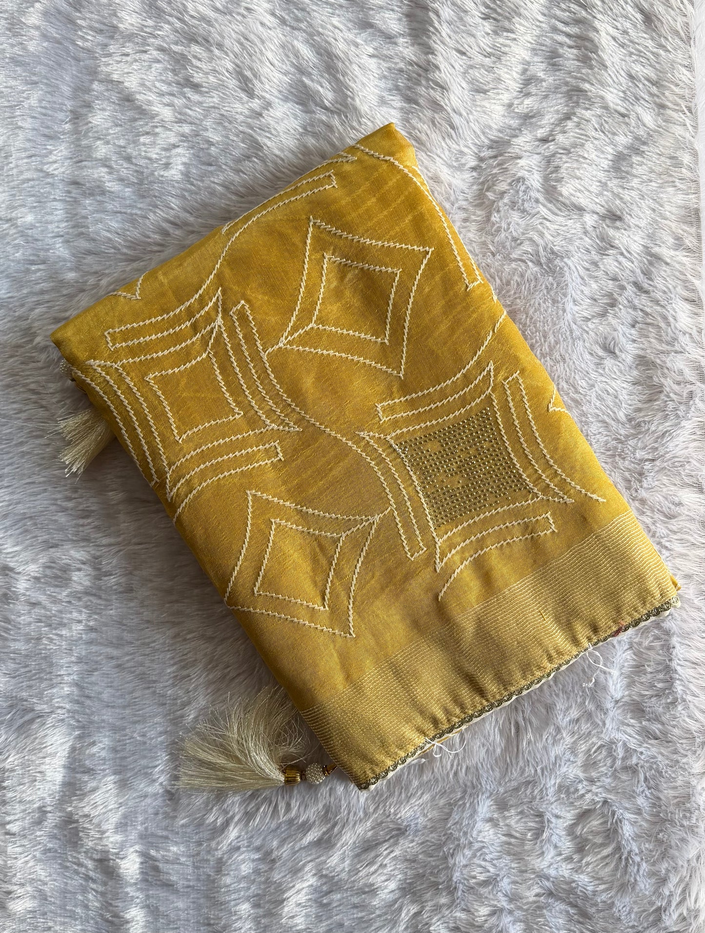 YELLOW SEMI TUSSAR WITH WHITE BLOUSE.