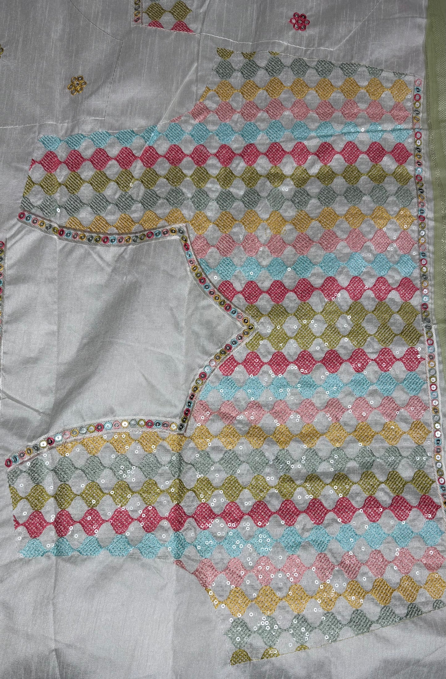 GREY SOFT NET SAREE WITH DESIGNER BLOUSE.