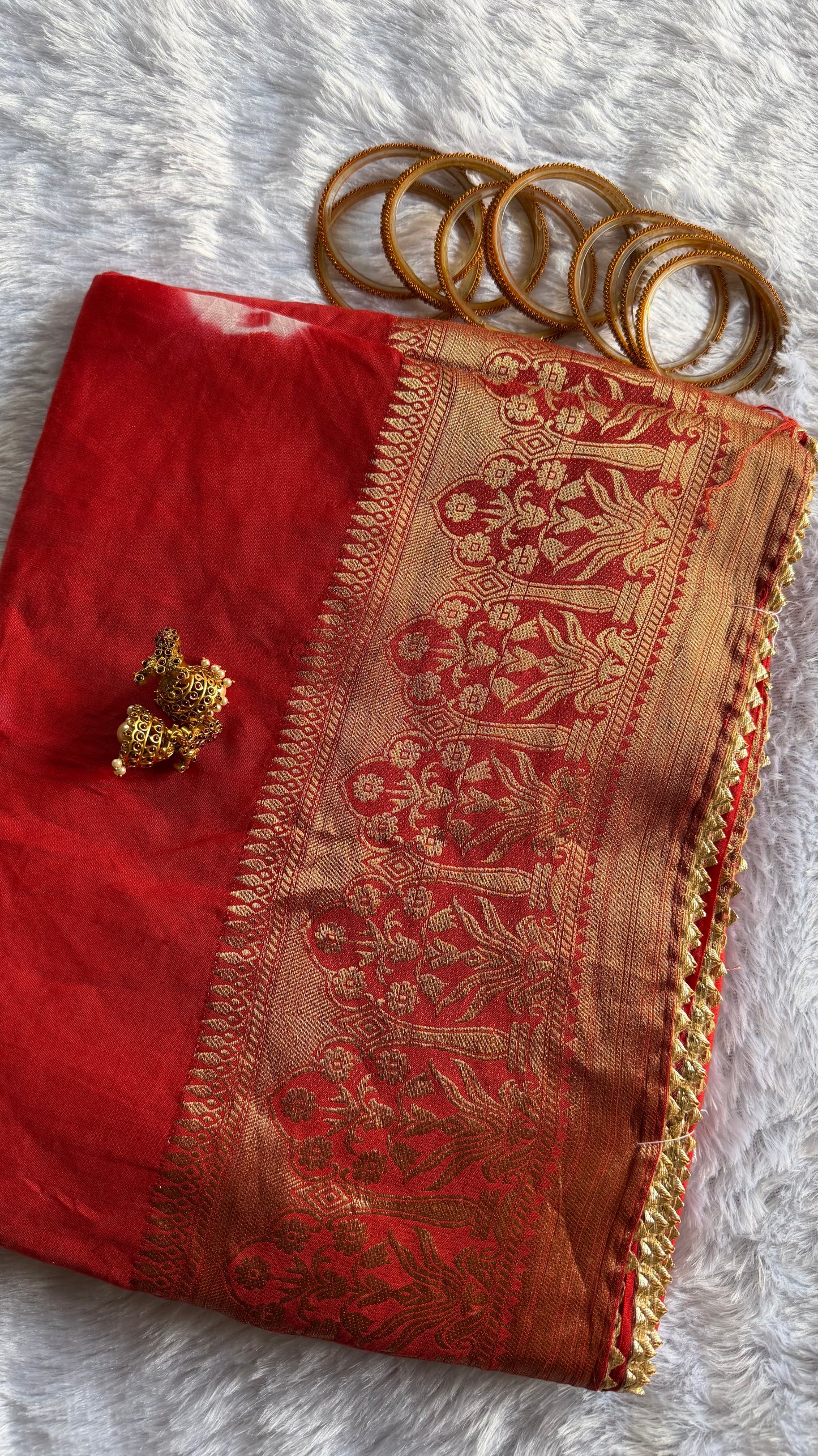 ORANGE SOFT MUSLIN COTTON WITH ZARI WEAVING.